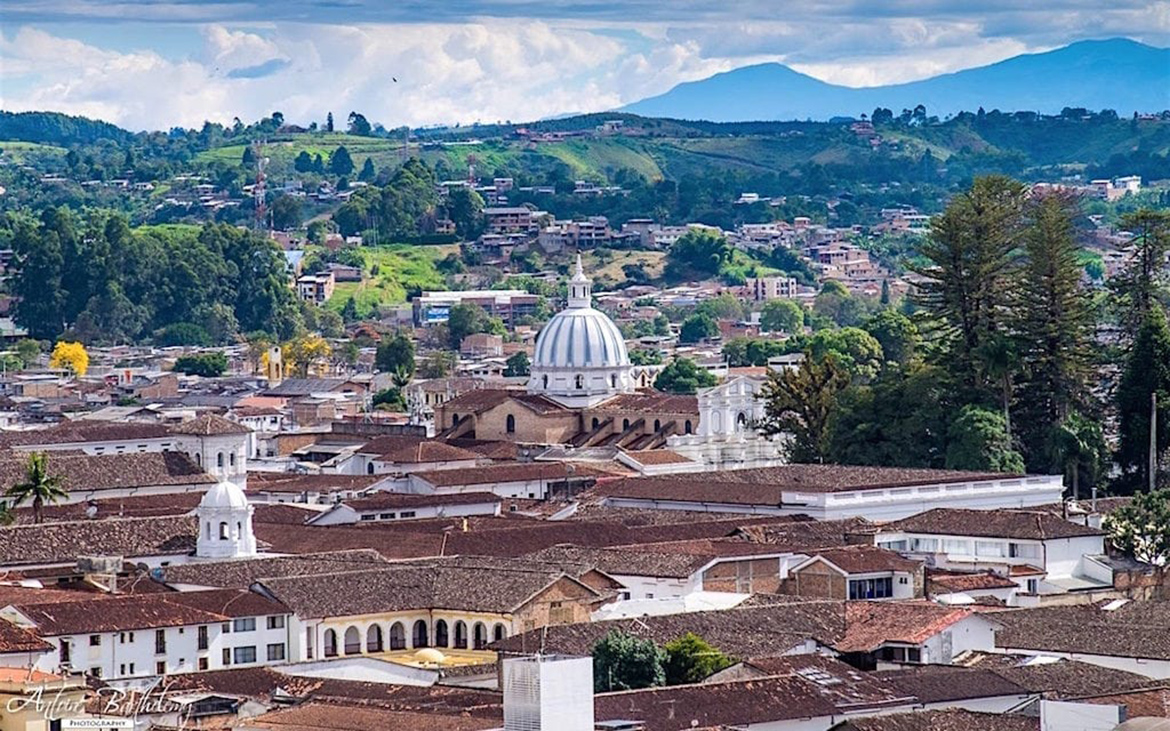 The cityscape of Popayan with the city’s white domed cathedral in the middle